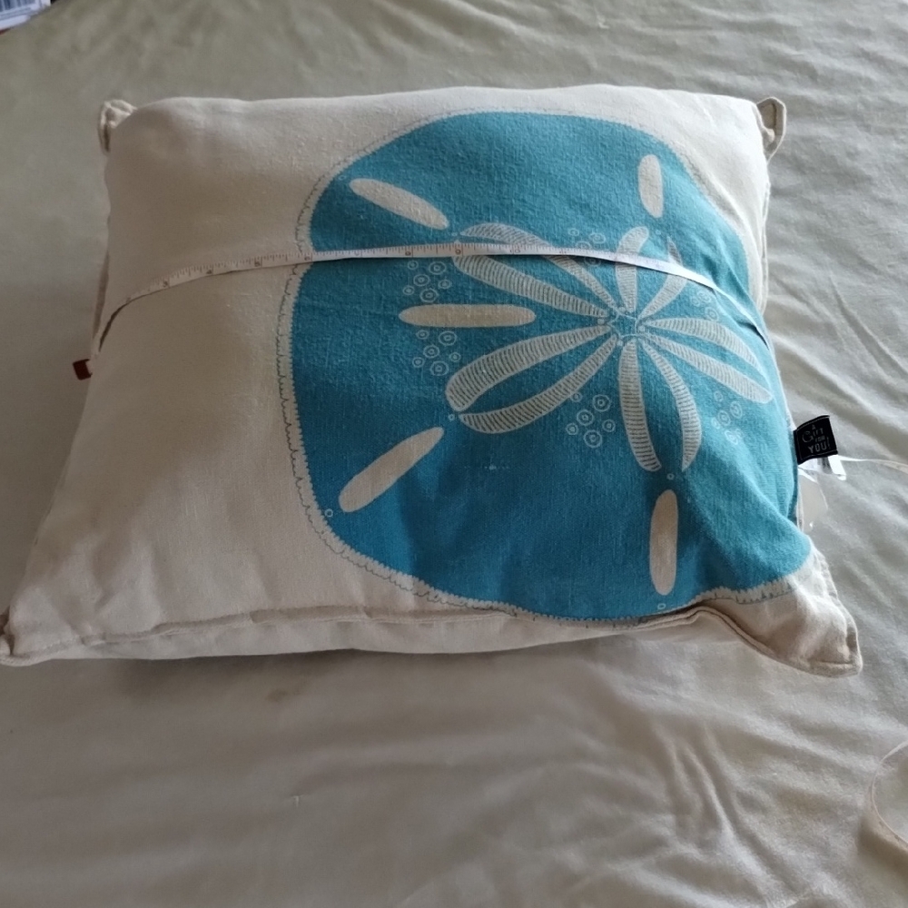 Turquoise Blue Sand Dollar On  Cream Backgound Pillow 17 X17